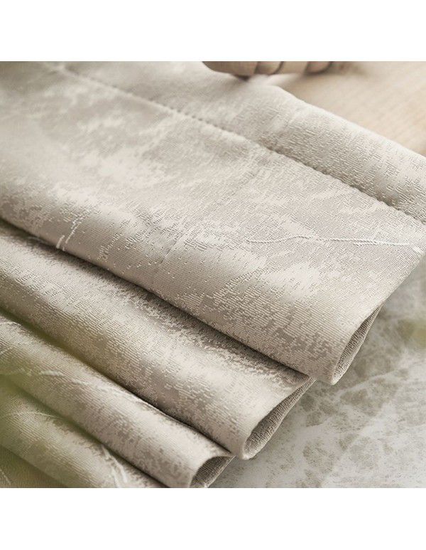 Send the finalized new fashion high-grade milk tea color curtain jacquard thickened wind proof and cold proof living room bedroom window